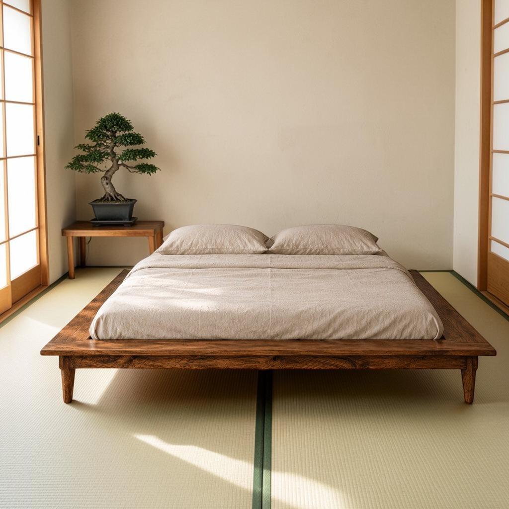 Homecrest Lyra low floor platform bed made of solid Sheesham wood with tapered legs in a minimalist bedroom setting.