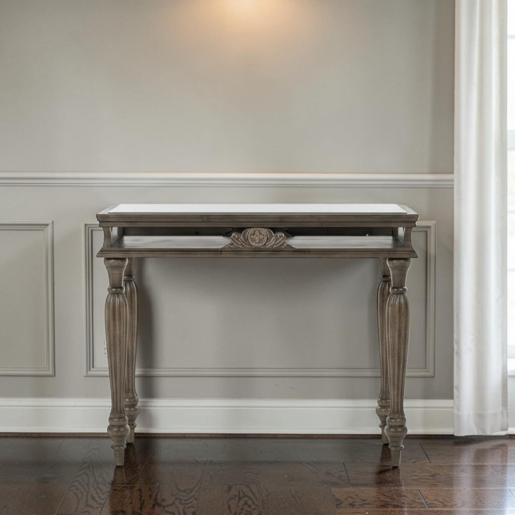 Homecrest Larkin console table in warm brown sheesham wood with a linear block design and elegant turned legs.