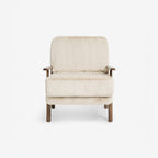 Homecrest Lars Scandi accent chair featuring a cream faux fur deep cushioned seat and a solid wood frame.