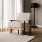 Homecrest Lars Scandi accent chair featuring a cream faux fur cushioned seat and a dark solid wood frame.