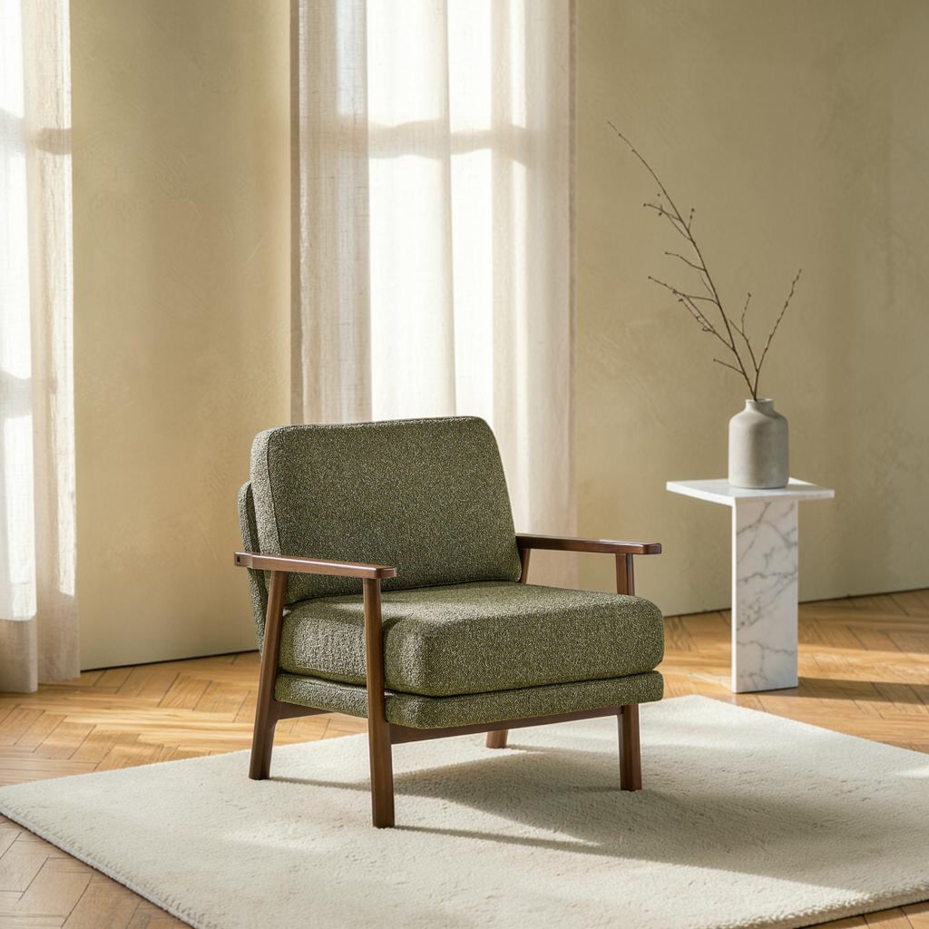 Homecrest Lars Scandi accent chair with olive green bouclé upholstery and a solid wood frame in a bright room.