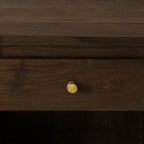 Homecrest Latimer bedside table featuring a dark brown hand-carved solid wood drawer with a round brass knob.