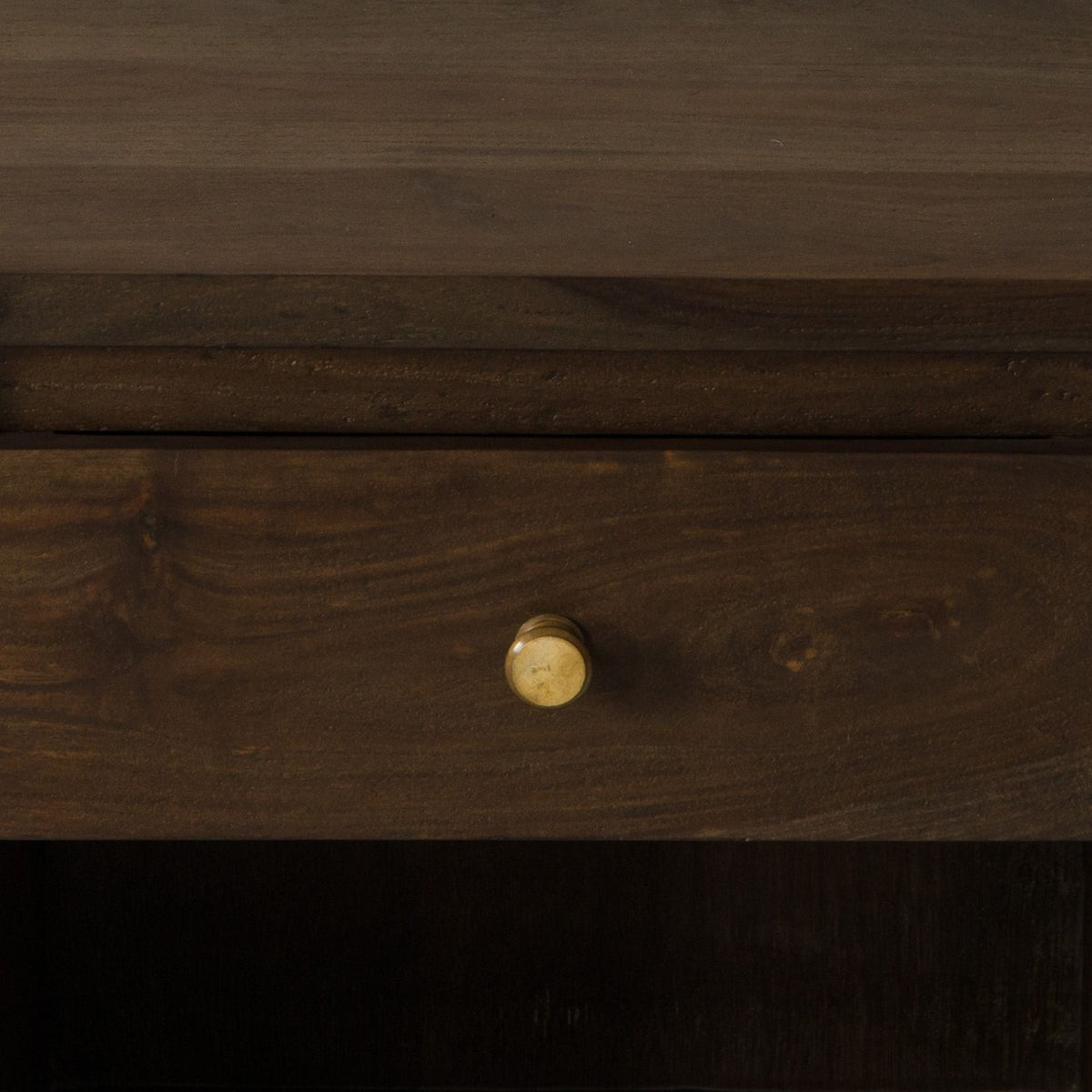 Homecrest Latimer bedside table featuring a dark brown hand-carved solid wood drawer with a round brass knob.