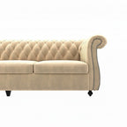 Homecrest Berkley Chesterfield sofa in beige velvet with classic tufted backrest, rolled arms, and nailhead trim.