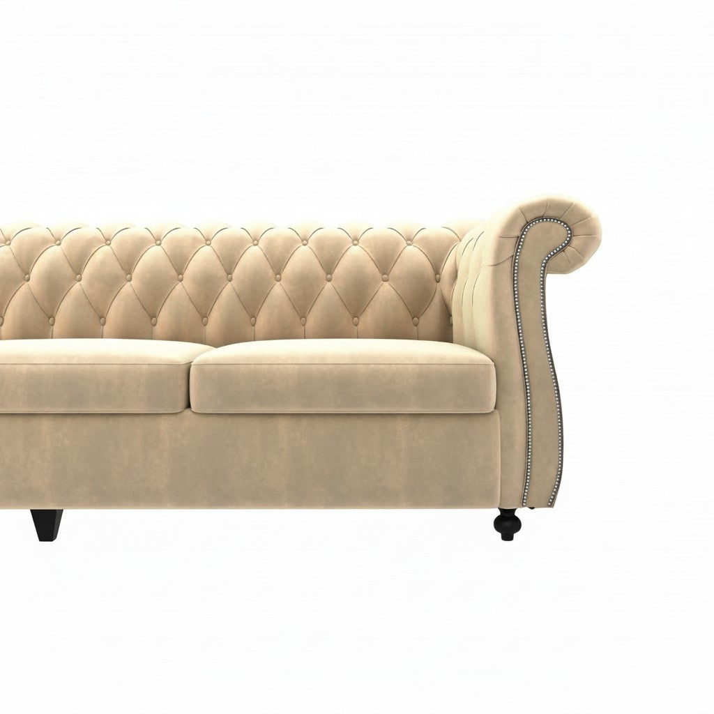 Homecrest Berkley Chesterfield sofa in beige velvet with classic tufted backrest, rolled arms, and nailhead trim.