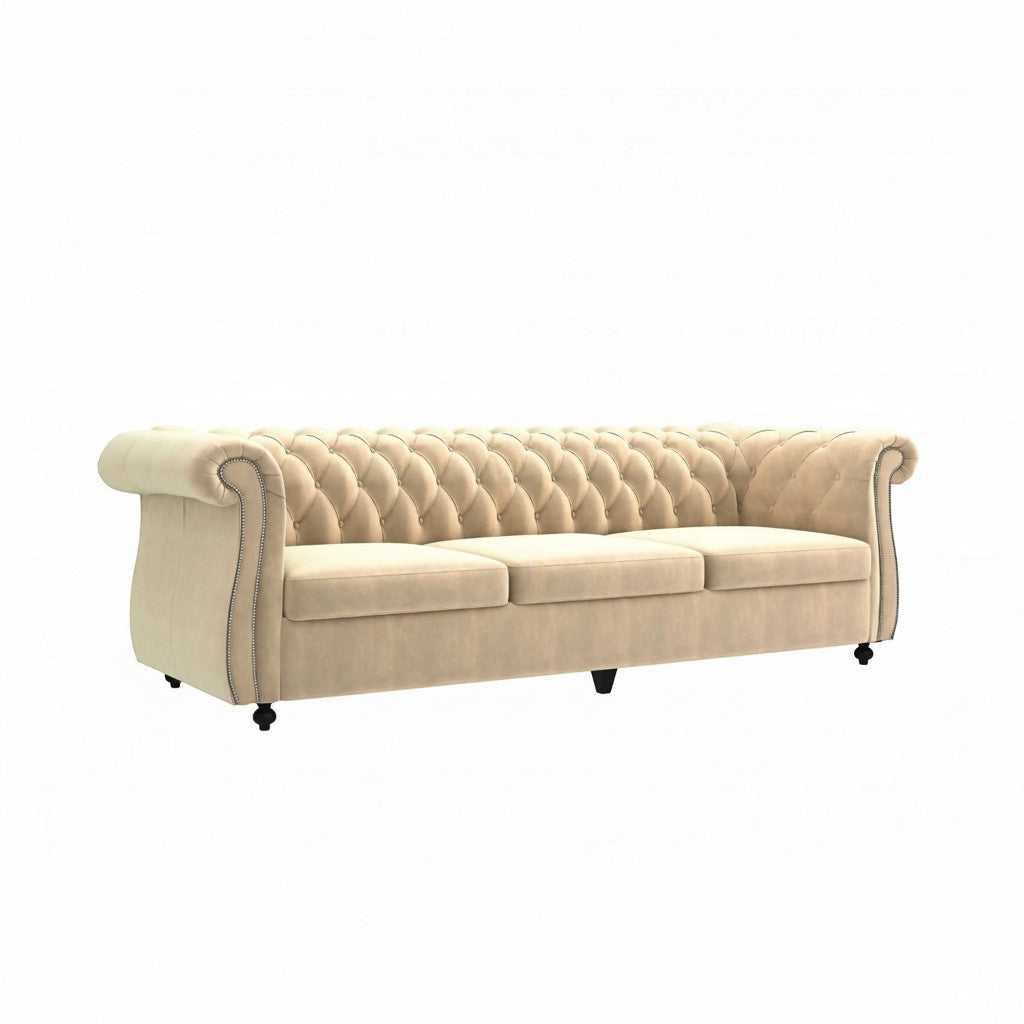 Homecrest Berkley three-seater Chesterfield sofa in beige velvet with tufted backrest and silver nailhead trim