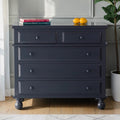 Homecrest Whitmore five-drawer chest in dark blue solid mango wood with beaded moulding and classic bun-foot legs.
