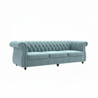 Homecrest Berkley three-seater Chesterfield sofa in dusk blue velvet with classic button tufting and nailhead trim.