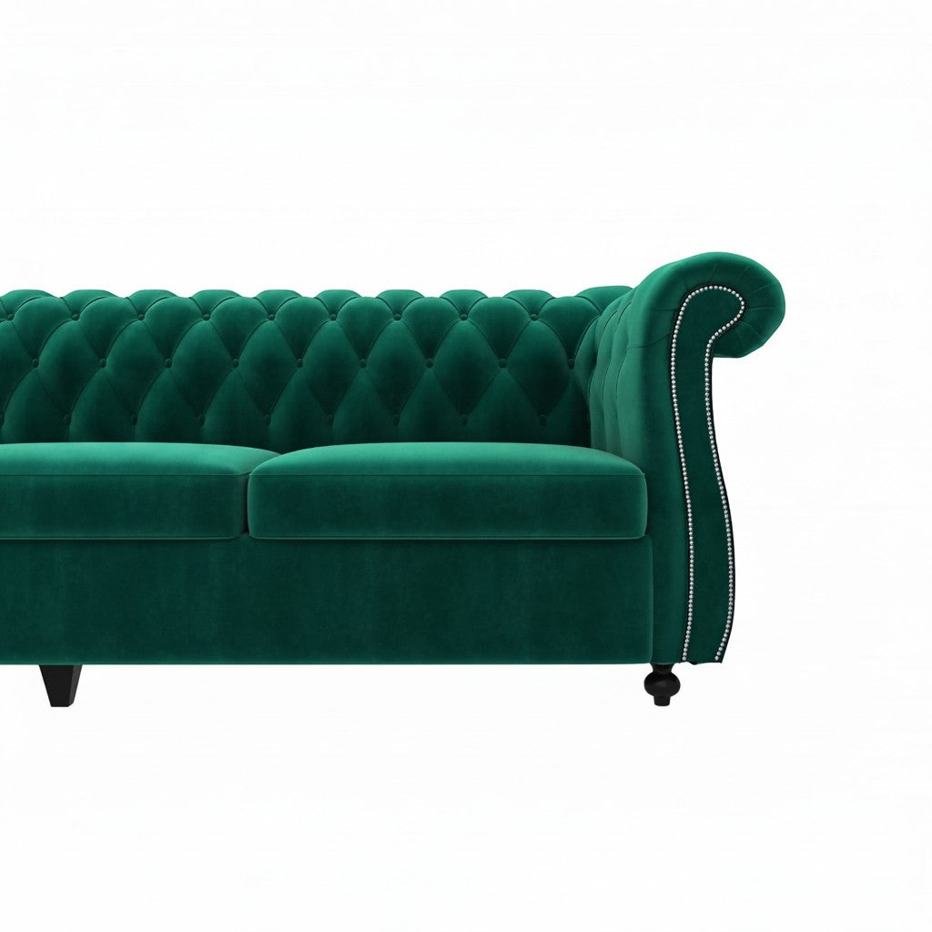 Homecrest Berkley Chesterfield sofa in emerald green velvet with tufted backrest and silver nailhead trim on armrest