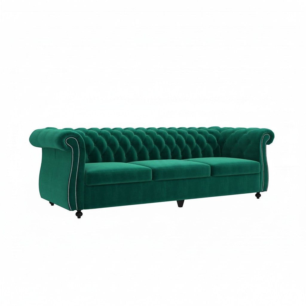 Homecrest Berkley three-seater Chesterfield sofa in emerald green velvet with button tufting and nailhead trim.