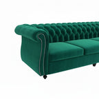 Homecrest Berkley emerald green velvet Chesterfield sofa with tufted backrest and silver nailhead trim on armrest