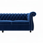 Homecrest Berkley Chesterfield sofa in deep indigo blue velvet with button tufting and silver nailhead trim detail.