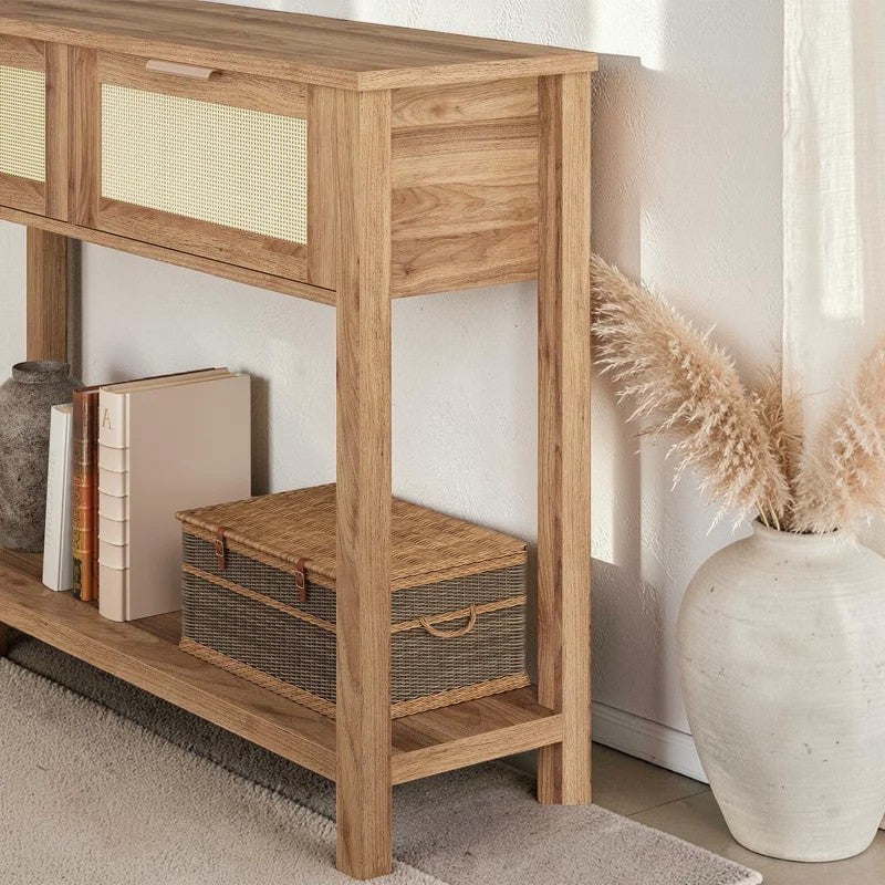 Homecrest Lorne console table in natural acacia wood with rattan door fronts and a lower display shelf