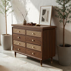 Homecrest Sennen solid Sheesham wood chest of drawers with honey finish, rattan drawer fronts, and brass hardware.