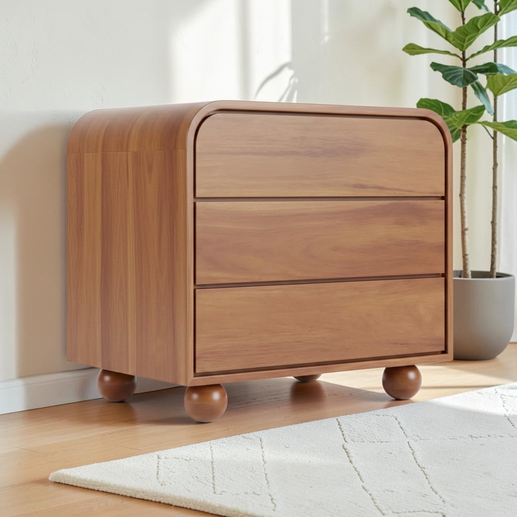 Homecrest Brisley brown acacia wood 3-drawer chest with a curved frame and round ball feet in a bright room