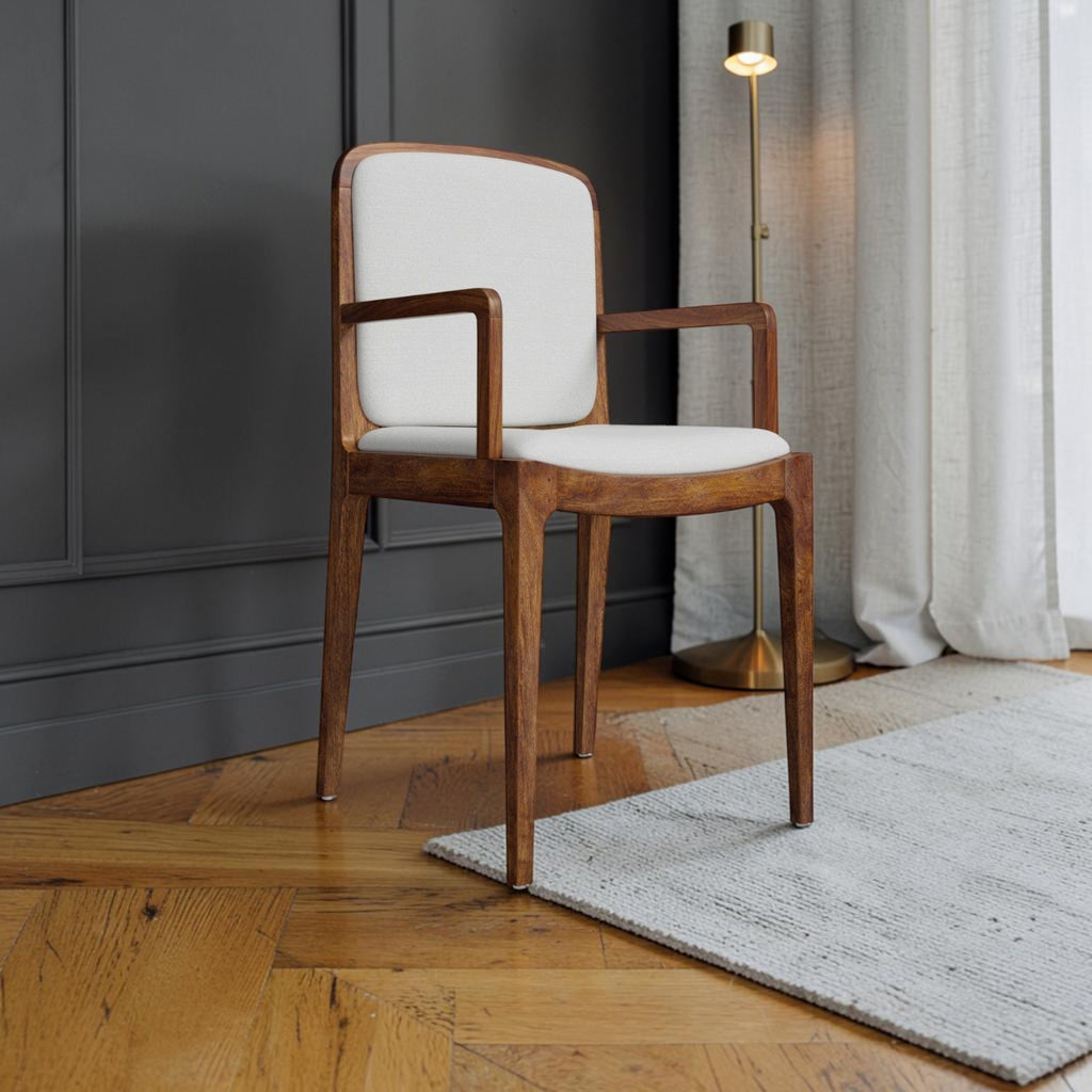 Homecrest Melbury dining chair in natural teak wood with white upholstered seat and backrest in a coastal setting.