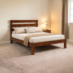 Homecrest Hadley solid Sheesham wood bed featuring a triple slat headboard and dark wood grain finish in a bedroom.