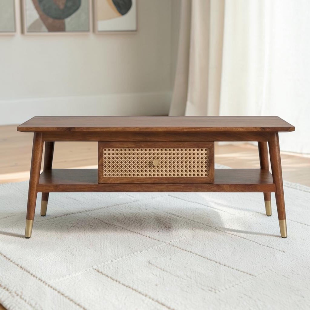 Homecrest Marlowe rectangular coffee table in natural wood with a woven cane drawer and brass-capped tapered legs.