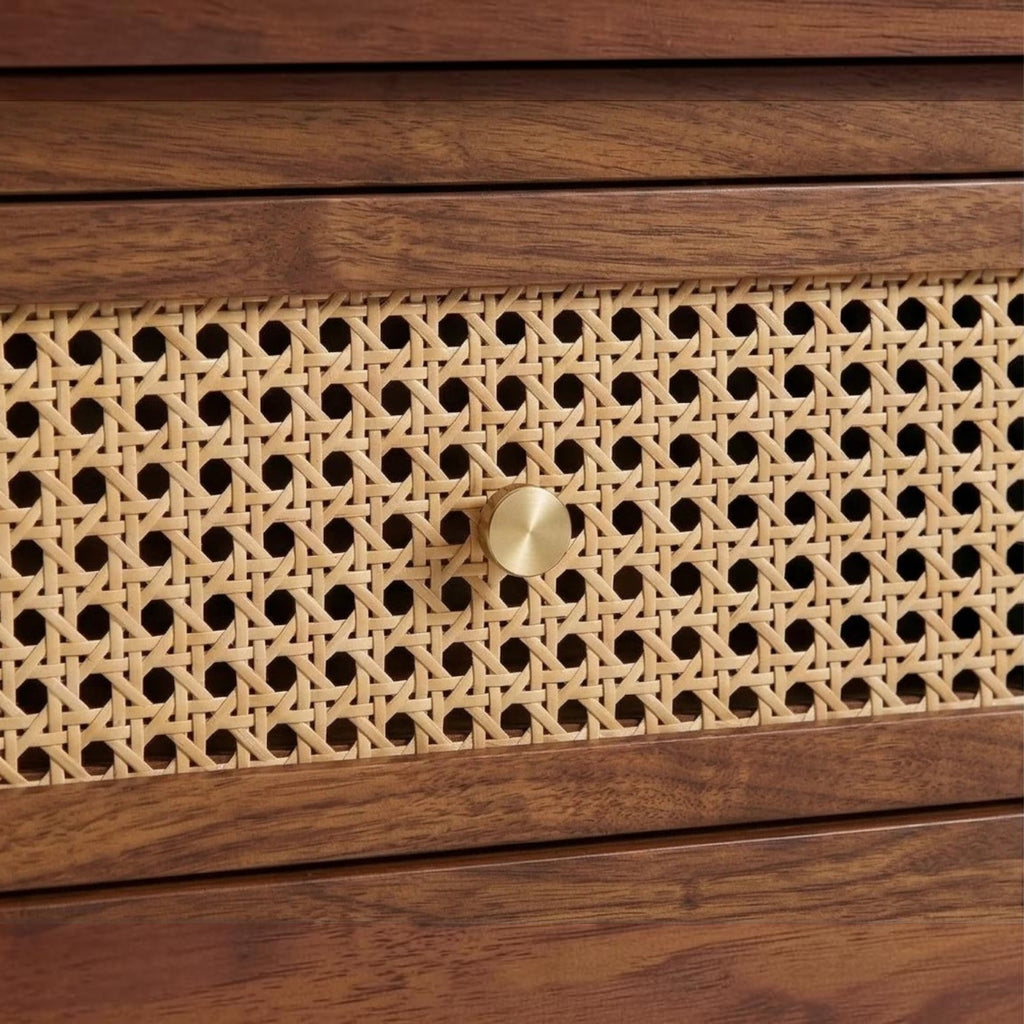Homecrest Marlowe coffee table drawer featuring a natural woven cane front panel and a small round brass knob.