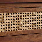 Homecrest Marlowe coffee table drawer featuring a natural woven cane front panel and a small round brass knob.