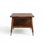 Homecrest Marlowe mid-century modern coffee table in natural solid wood with angled legs and brass caps