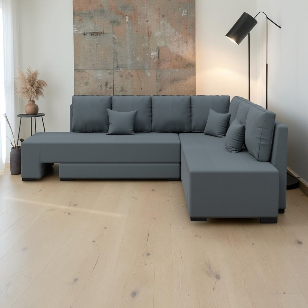 Homecrest Merrow L-shape sofa bed in dark grey velvet with a solid wood frame and matching throw pillows