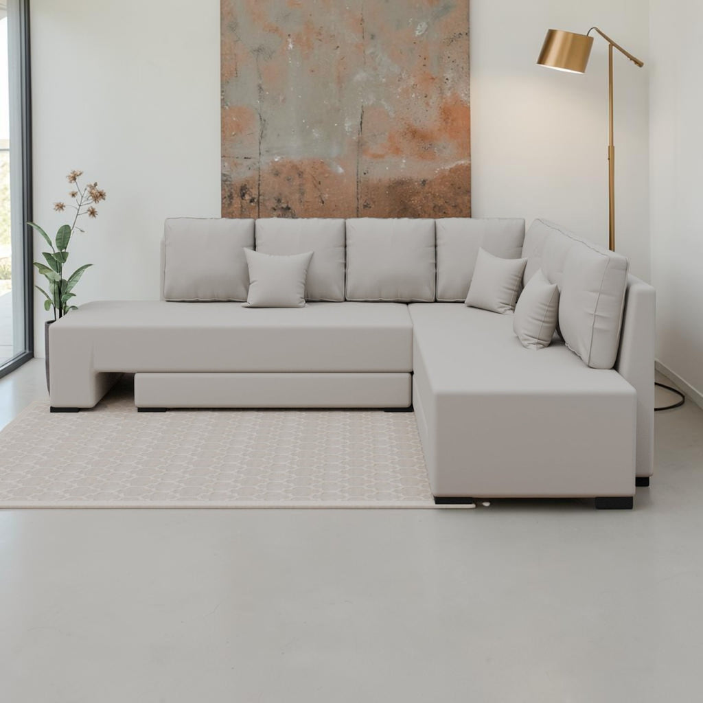 Homecrest Merrow L-shape sofa bed in light grey velvet with a solid wood frame and matching throw pillows