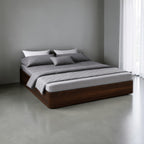 Homecrest Neave solid sheesham wood storage bed in dark finish with grey bedding, no headboard design