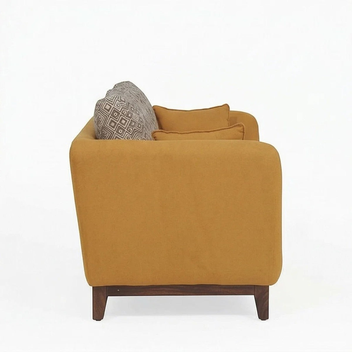Homecrest 2-seater sofa in mustard fabric with curved armrests, solid wood base, and patterned back cushions.