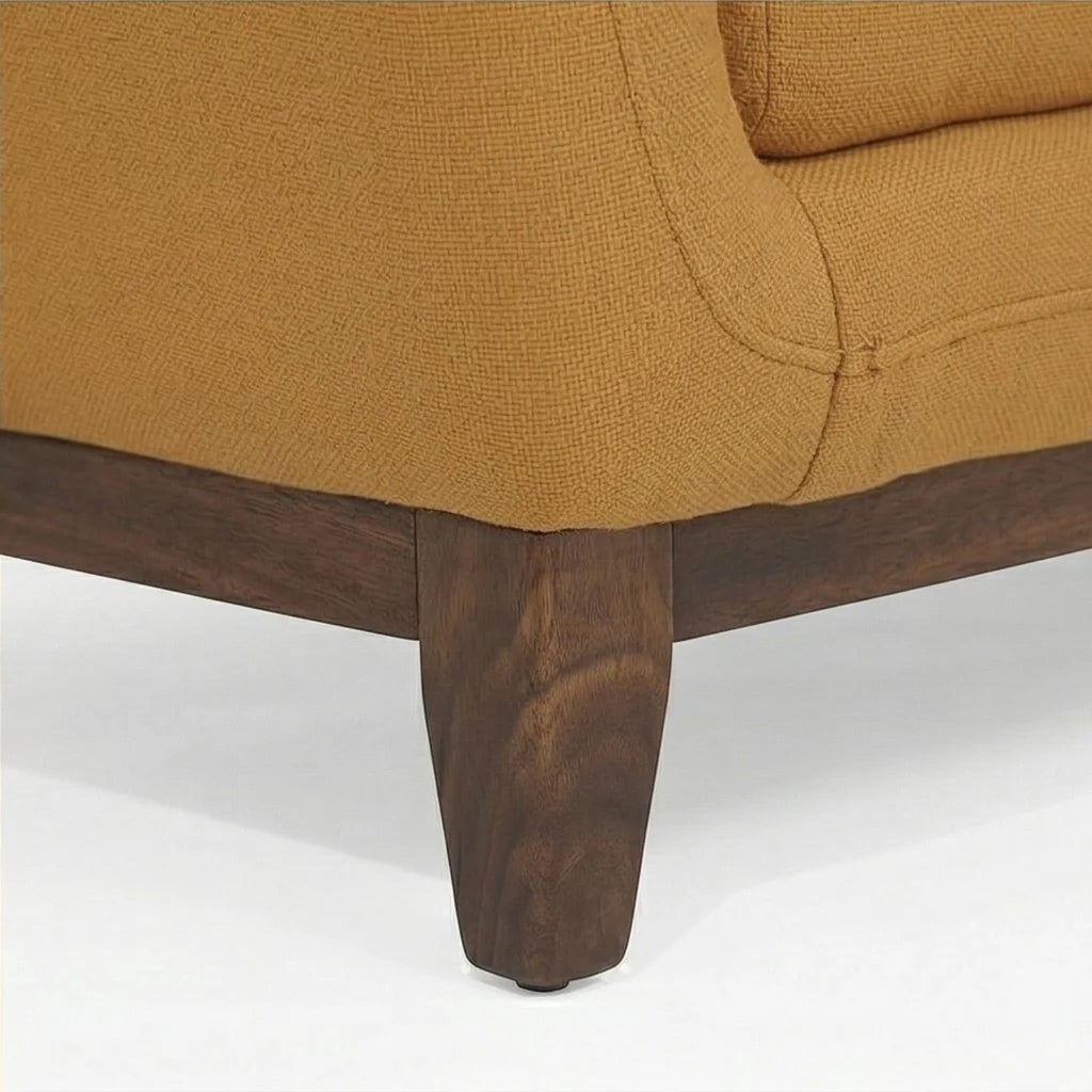 Homecrest 2-seater sofa featuring mustard fabric upholstery and a solid wood base with tapered legs