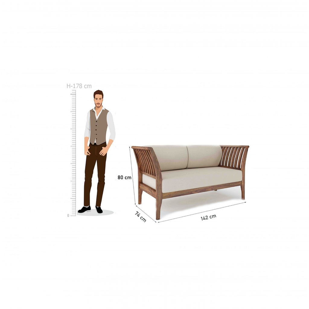 Homecrest Naunton sheesham wood sofa with teak finish, beige upholstered cushions, and slatted armrests.