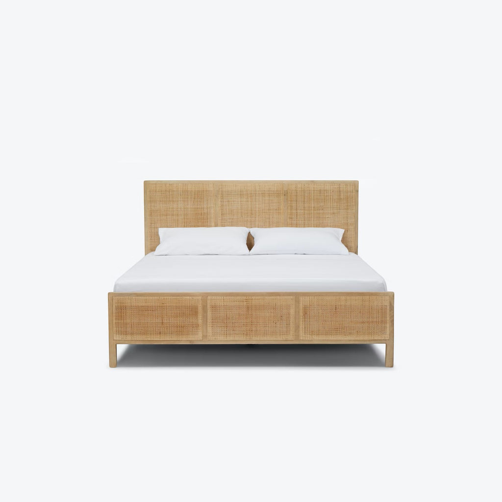 Homecrest natural mango wood bed frame featuring a woven rattan headboard and footboard in a minimalist design.