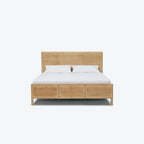 Homecrest natural mango wood bed frame featuring a woven rattan headboard and footboard in a minimalist design.
