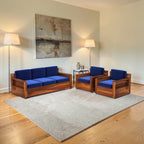 Homecrest Netley 5 seater sofa set in blue fabric with walnut finish Sheesham wood frames in a modern living room.