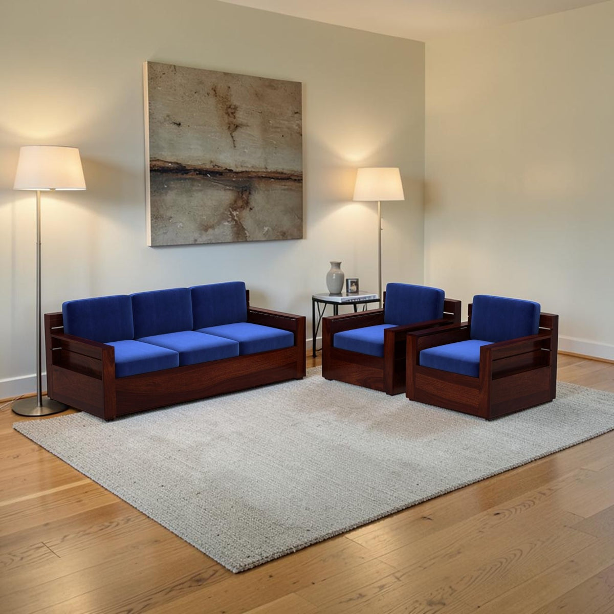 Homecrest Netley 5 seater sofa set in blue upholstery with dark walnut finish sheesham wood frames in a living room.