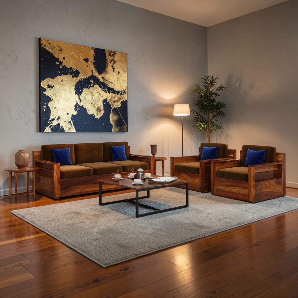 Homecrest Netley 5 seater brown sheesham wood sofa set with blue cushions in a modern living room setting