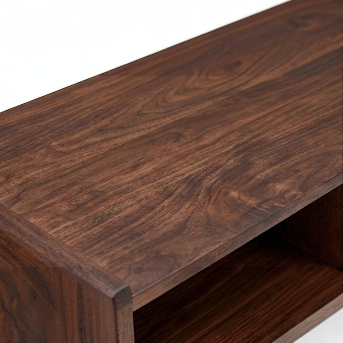 Homecrest Nyle mid-century modern coffee table in dark solid wood with rounded edges and an open shelf design