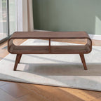 Homecrest Nyle mid-century coffee table in natural solid wood with rounded edges, dual open shelves, and angled legs.