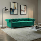 Homecrest Oakley emerald green velvet Chesterfield sofa with tufted back and nailhead trim in a modern living room