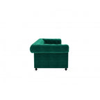Homecrest Oakley Chesterfield sofa in emerald green velvet with tufted detailing and rolled armrest, side view