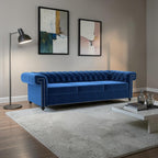 Homecrest Oakley three-seater Chesterfield sofa in deep indigo blue velvet with tufted back and nailhead trim