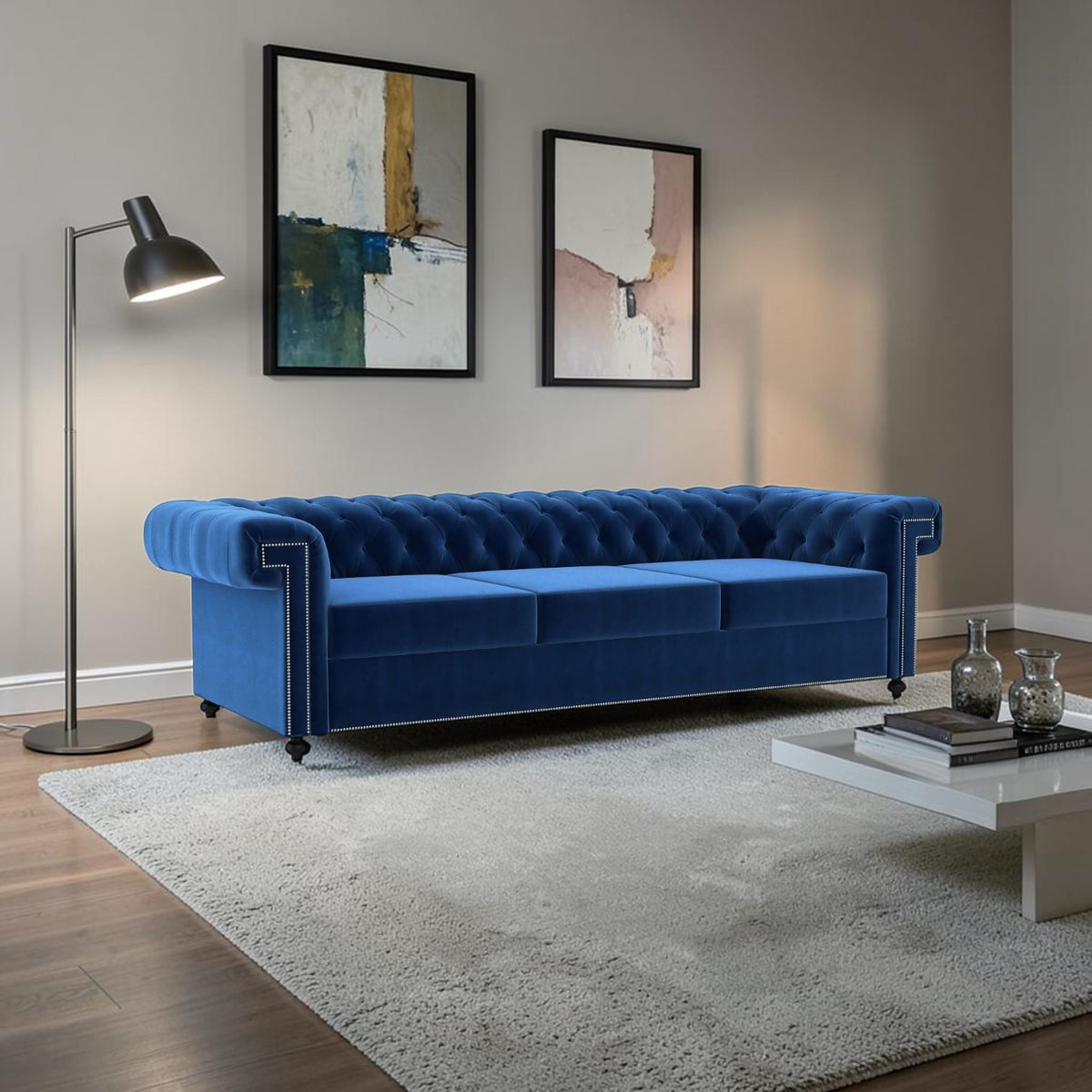 Homecrest Oakley three-seater Chesterfield sofa in deep indigo blue velvet with tufted back and nailhead trim