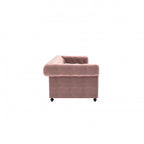 Homecrest Oakley Chesterfield sofa in rose dust velvet with tufted detailing and side view profile