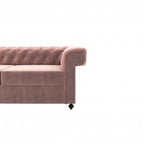 Homecrest Oakley Chesterfield sofa in rose dust velvet with button tufting, rolled armrest, and silver nailhead trim.