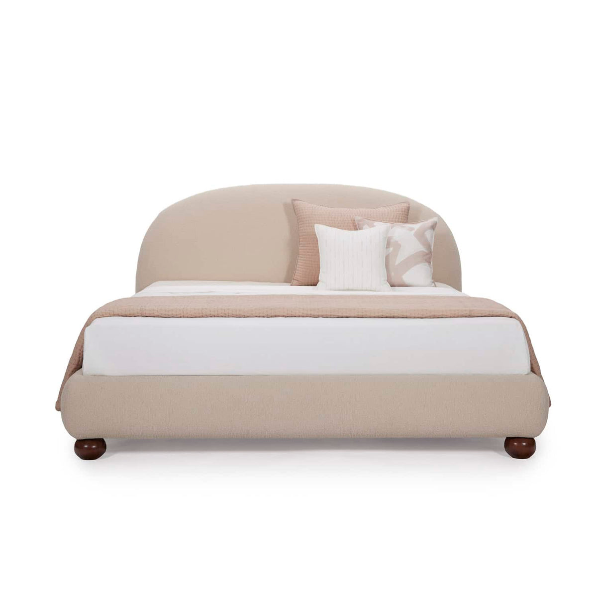 Homecrest Penhurst teakwood bed with a curved upholstered headboard and low profile frame in a neutral beige fabric.