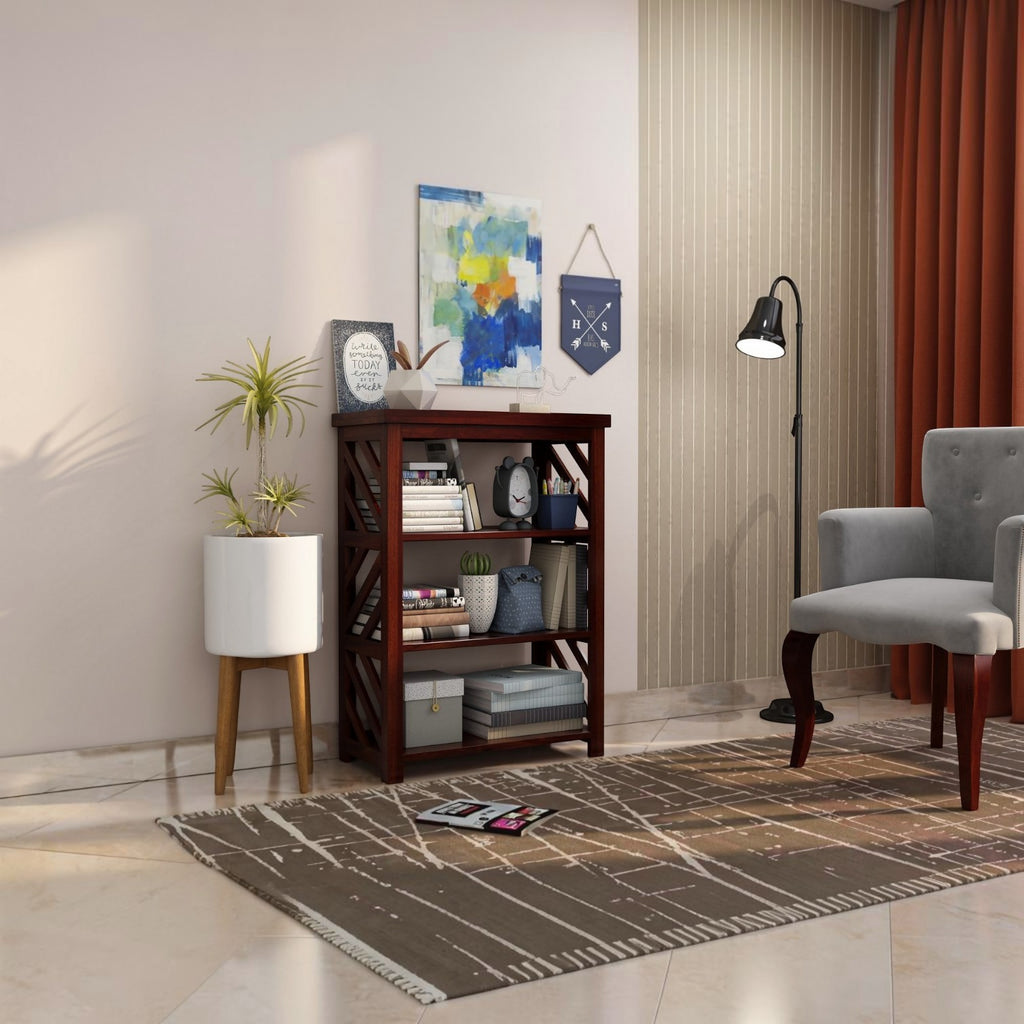Homecrest Perrin compact sheesham bookshelf with open shelves and two base drawers in a modern living room setting.