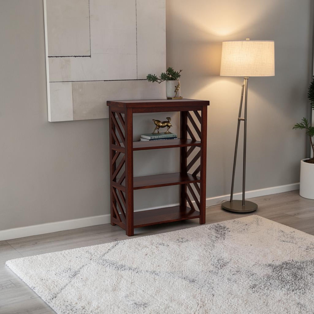 Homecrest Perrin compact bookshelf in dark walnut sheesham wood with open shelves and decorative side lattice detail.
