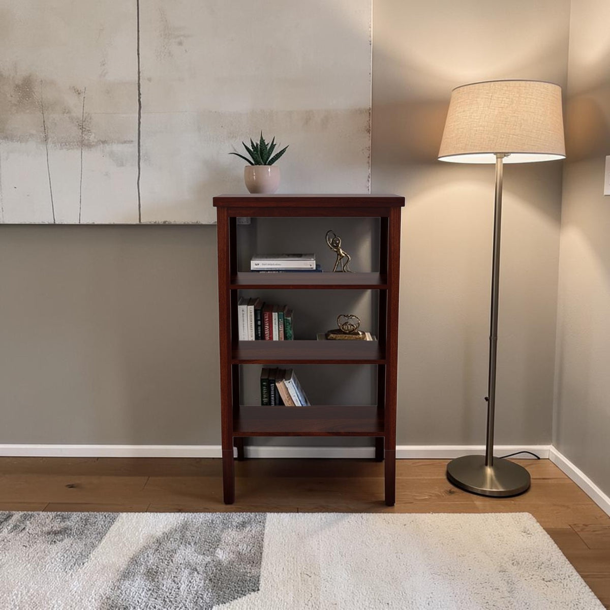Homecrest Perrin compact bookshelf in dark walnut sheesham wood with open shelves and two base drawers in a living room