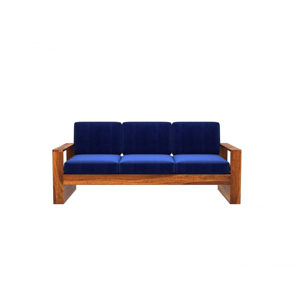 Homecrest Pilton wooden sofa with a rich walnut finish frame and deep blue fabric cushions in a modern design.