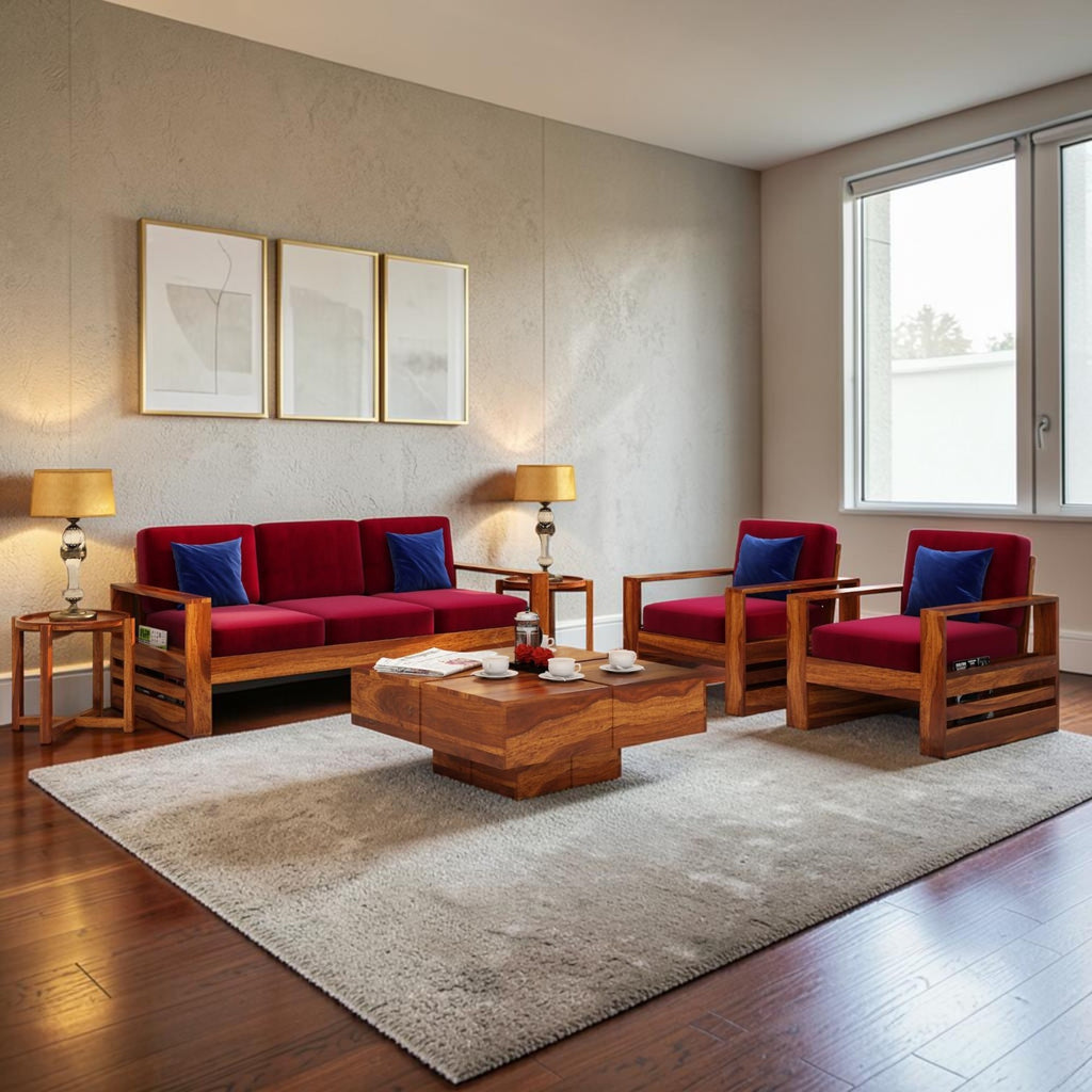 Homecrest Pilton wooden sofa set with red fabric cushions, sheesham wood frame, and matching coffee table in a room.